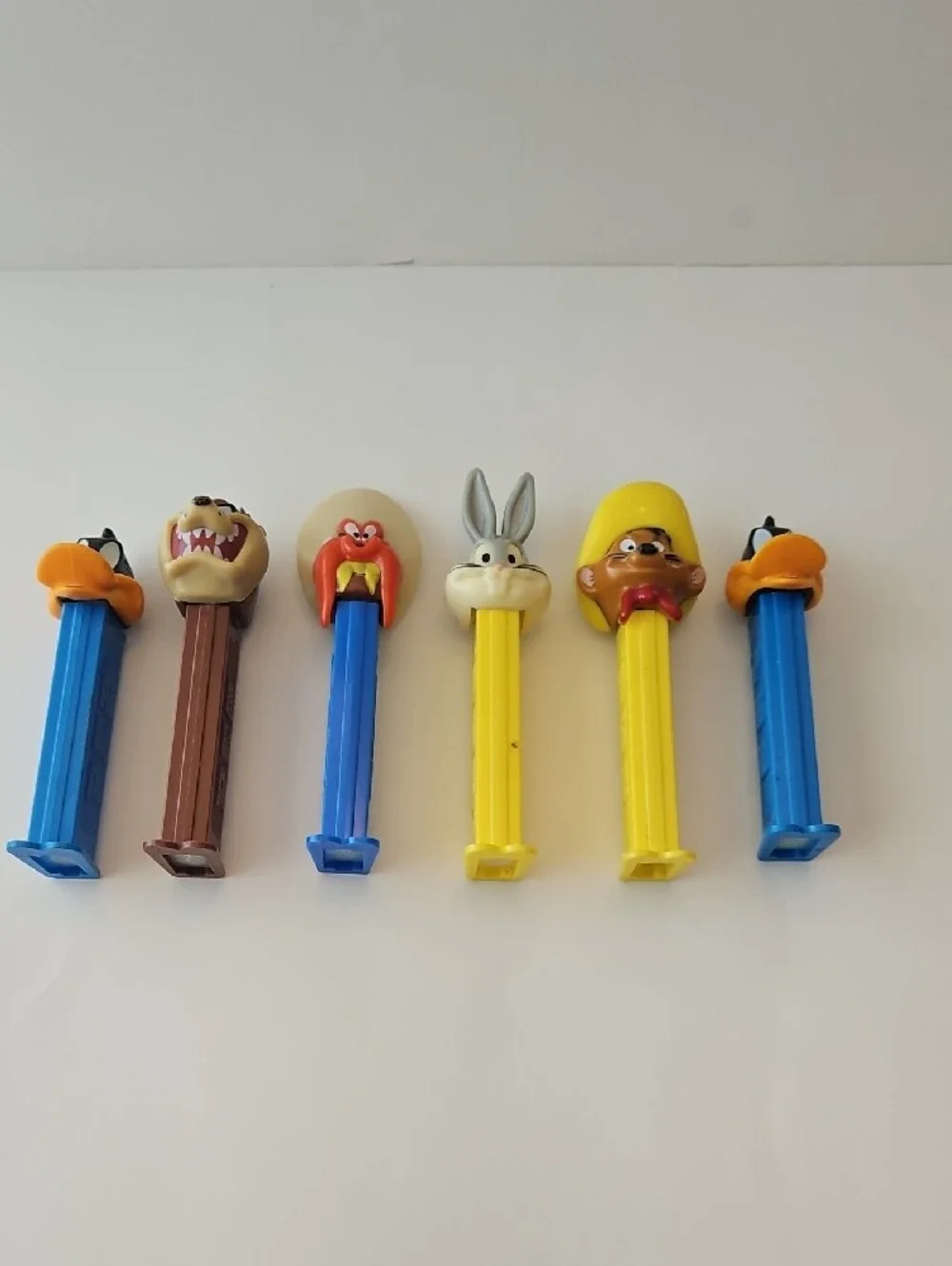 Vintage-Classic Cartoon Character PEZ Candy Dispensers - Blue, Yellow, Brown